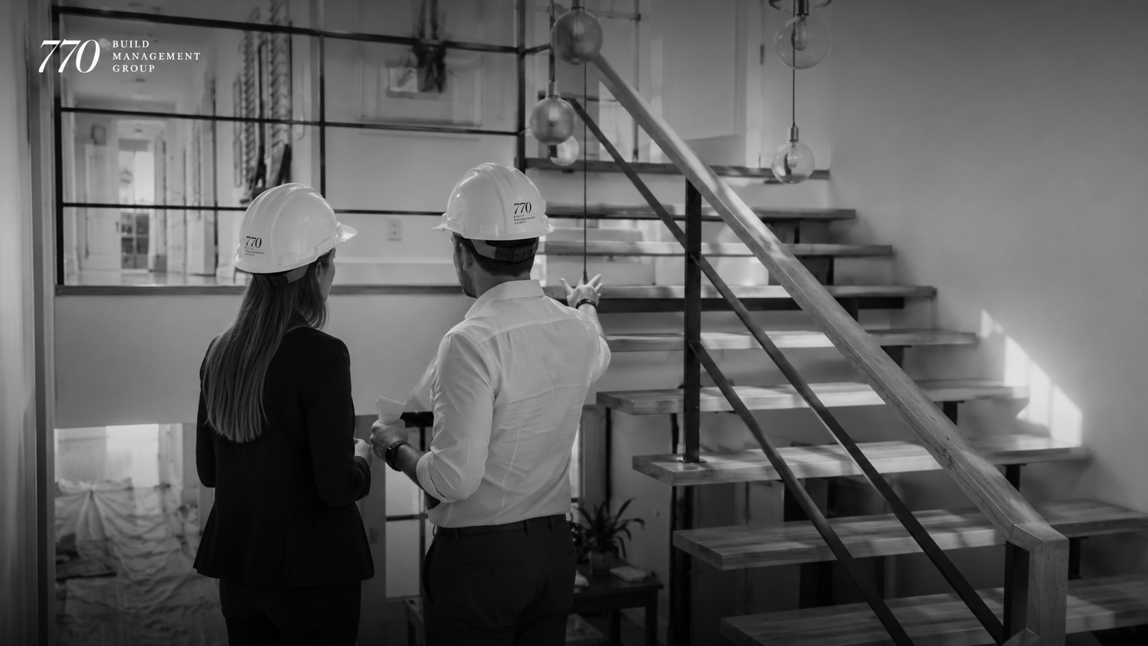 770 team reviewing a staircase installation